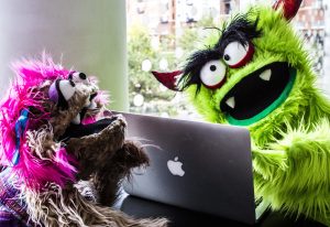 A promotional image for Chameleon Theatre Circle's Avenue Q showing what the Internet is for.