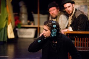 The Assistant Stage Manager (Sulia Rose Altenberg) interrupts the understudies' concentration. Photo by Justin D. Gallo Photography.